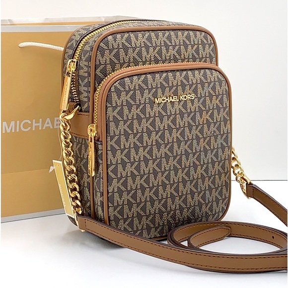 Michael Kors Handbags - MICHAEL KORS
Jet Set Travel Medium Signature Logo Crossbody Bag
COLOR BROWN GOLD